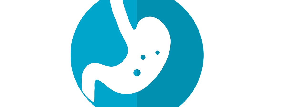 Ein Symbol eines Magens in einem blauen Kreis.